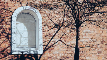 A vintage English window symbolizing nostalgia, introspection, and memories.の写真素材
