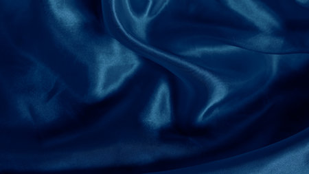 Dreamy silk texture in soft blue shades with flowing waves and delicate glowの写真素材