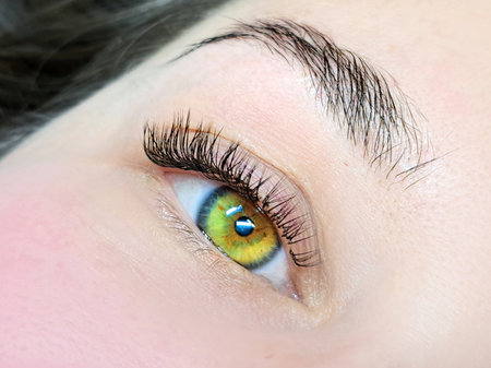 close up of eyelash extensions in beauty salon macro eye.の写真素材