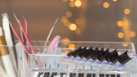 close up of equipment for eyelash extensions in beauty salon,tools ,tweezers,patches,false lashes