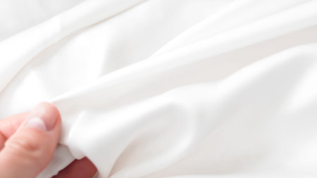 Creamy white silk background used in soft branding and minimal photo styles.