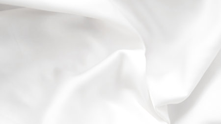 White flowing silk with natural folds used in beauty product photo concepts.の写真素材