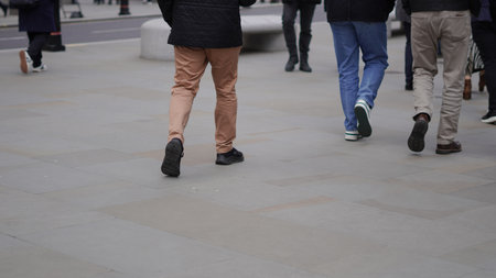 People walking casually, everyday life in the city.の写真素材