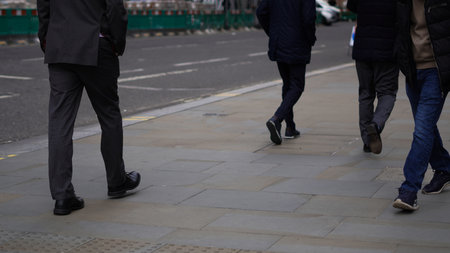 Crowd walking anonymously in an urban setting.の写真素材