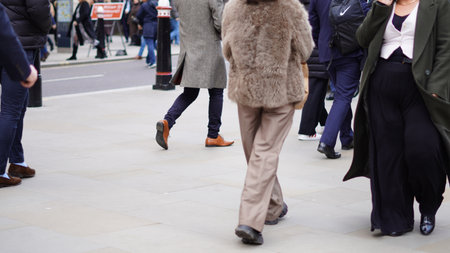 City workers walking to work on a weekday morning.の写真素材