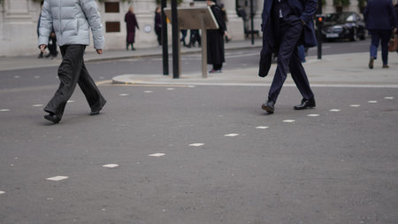 Weekday city life with people walking along urban streets.の写真素材