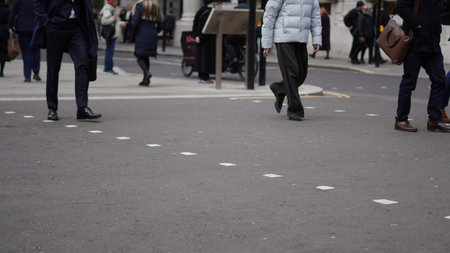 City workers walking to work on a weekday morning.の写真素材