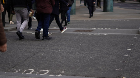Crowd walking anonymously in an urban setting.の写真素材