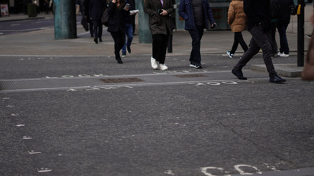 People walking casually, everyday life in the city.の写真素材