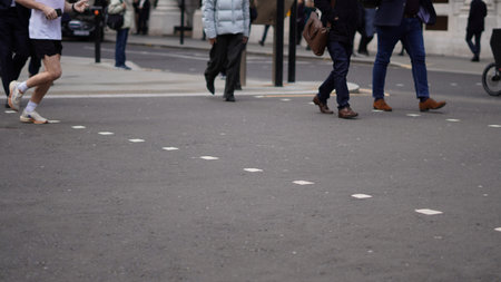 City workers walking to work on a weekday morning.の写真素材