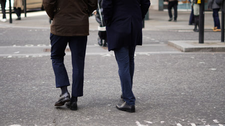 Crowd walking anonymously in an urban setting.の写真素材