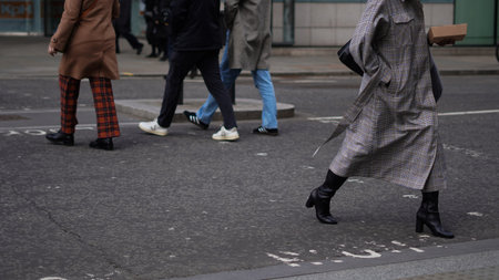 Crowd walking anonymously in an urban setting.の写真素材