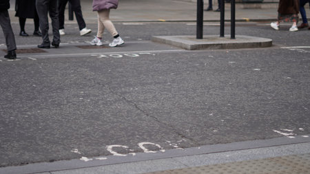 People walking casually, everyday life in the city.の写真素材