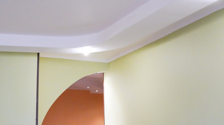 Artistic modern ceiling light concept with geometric shapes and glow.の写真素材