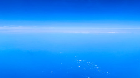 Aerial view of serene sky representing travel freedom and new experiencesの写真素材