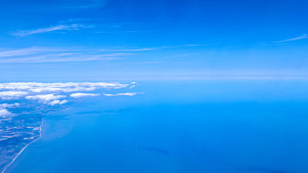 Aerial view of serene sky representing travel freedom and new experiencesの写真素材