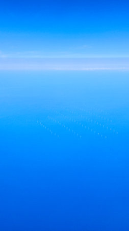 Aerial view of serene sky representing travel freedom and new experiencesの写真素材