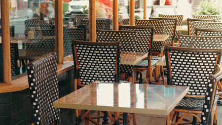 Cozy city cafe with vintage furniture, small tables and inviting street style