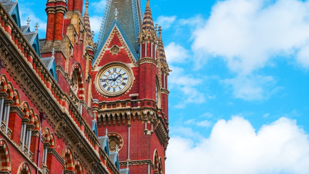 Famous Victorian tower in London with ornate details and Gothic spire tops