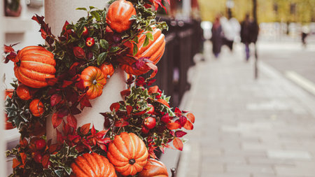 Rustic fall doorway with pumpkins and natural harvest accents.