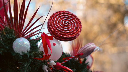 Close up of glowing Christmas market decoration with festive warm lights atmosphere.の写真素材