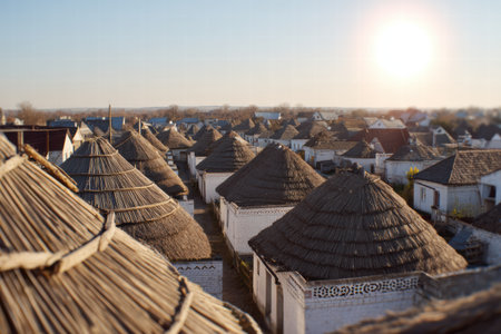 Soft blurred view of Ukrainian village with traditional huts and folk warmspirit..の素材