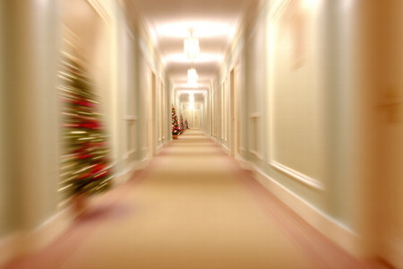 Blurred hotel interior creating soft festive atmosphere with gentle Christmas mood.の素材