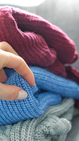 Knitted sweater concept focused on winter comfort, warmth, and everyday style.の写真素材