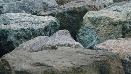 Massive weathered granite rocks creating a rugged, textured natural background