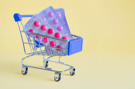 Shopping cart with pill blistersの写真素材