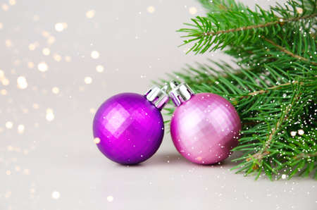 Christmas tree decoration on the background of fir branchesの写真素材