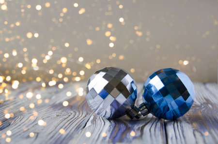 Christmas decorations in blue on a wooden background