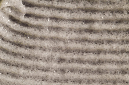 The texture of the cosmetic scrub is gray. Close-upの写真素材