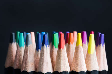 Colored pencils close-up on a wooden backgroundの写真素材