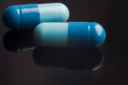Medical capsules are on the tableの写真素材