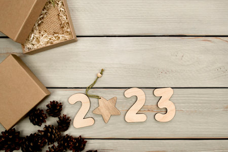 Happy New Year 2023. Symbol from number 2023 on wooden backgroundの写真素材
