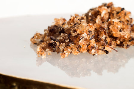 body scrub with sea salt, scattered on a light surfaceの写真素材