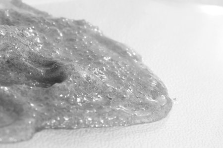 A smear of scrub on a color background. The concept of beauty.の写真素材