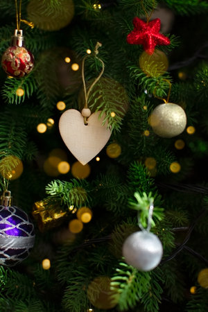 the decoration is hanging on the Christmas treeの写真素材