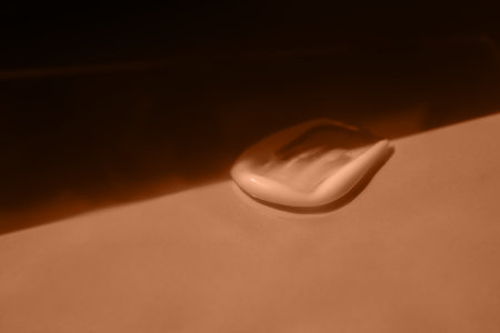 face cream on a light background. Color peach fuzz.の写真素材