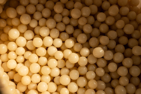 homeopathic beads on a light background. Alternative homeopathic medicine: herbs, healthcare and pills concept. View from above.の写真素材