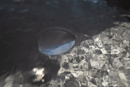 Drop of cosmetic product on a light background