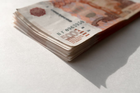 Banknotes of Russia. Stack of money on a light background. Close-up of moneyの写真素材