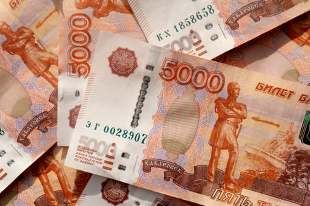 Russian banknotes. Money scattered on the surface. Close-up of money