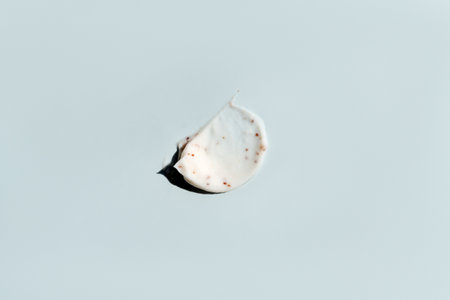 face scrub on a light backgroundの写真素材