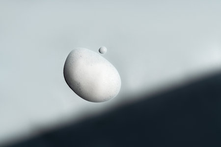 image of soap foam bubbles on a light backgroundの写真素材