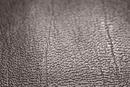 Beautiful texture of a fine brown leather surface using as background or header.の写真素材
