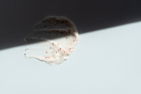 face scrub on a light backgroundの写真素材