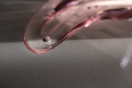a drop of transparent liquid. Abstract background