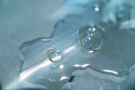 pipette with a drop of cosmetic productの写真素材